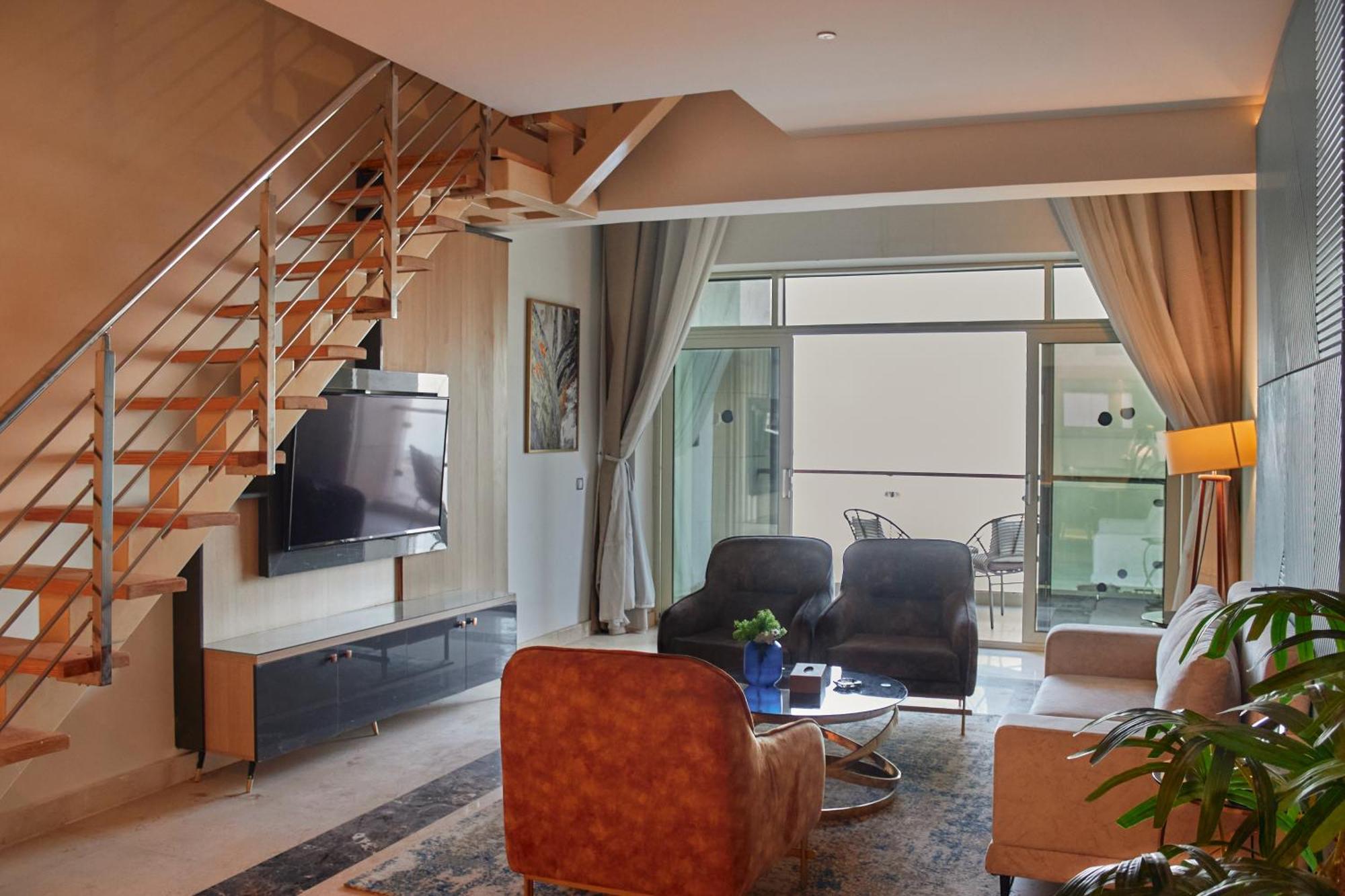 Tolip Resort El Galala Hills Αΐν Σούχνα Εξωτερικό φωτογραφία A living room in a typical apartment