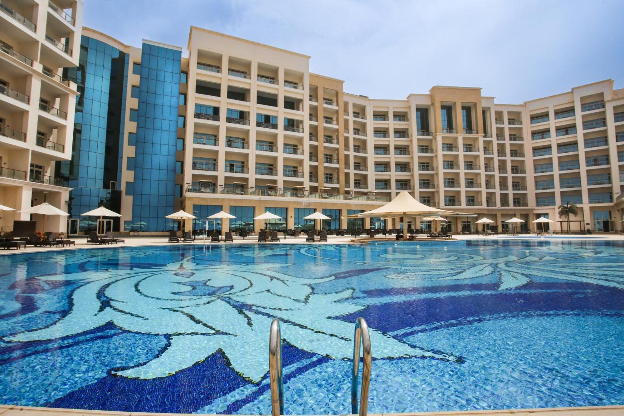 Tolip Resort El Galala Hills Αΐν Σούχνα Εξωτερικό φωτογραφία The swimming pool at the hotel